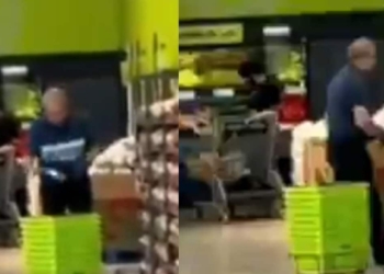 Empleado-limpia-canastas-de-supermercado-con-saliva