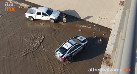 Hallan cadáver de mujer flotando en canalización del Río