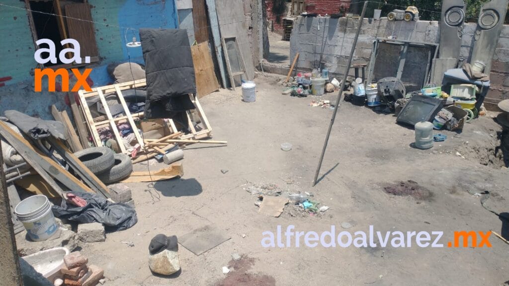 ENCUENTRAN CADáVERES DE DOS JóVENES EN UN PATIO