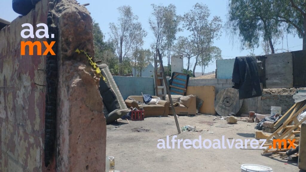 ENCUENTRAN CADáVERES DE DOS JóVENES EN UN PATIO