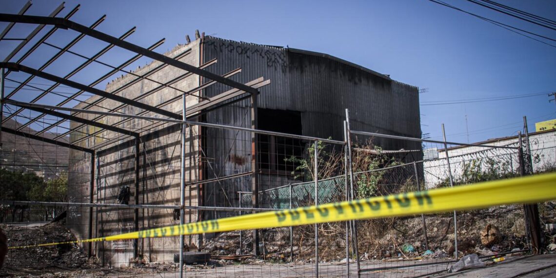 Localizan cadáver decapitado en bodega abandonada