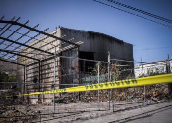 Localizan cadáver decapitado en bodega abandonada